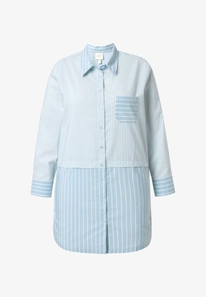 Modrá pruhovaná košile s dlouhými rukávy, zapínáním na knoflíky a náprsní kapsou s vodorovnými pruhy. Měkká látka s volnějším střihem.