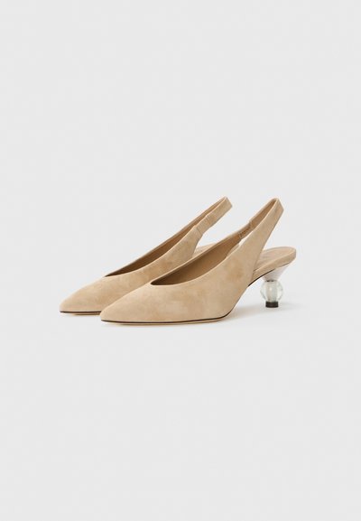 Beige suede slingback shoes with a pointed toe and a clear, rounded heel. The sleek design features a cutout and minimal stitching.