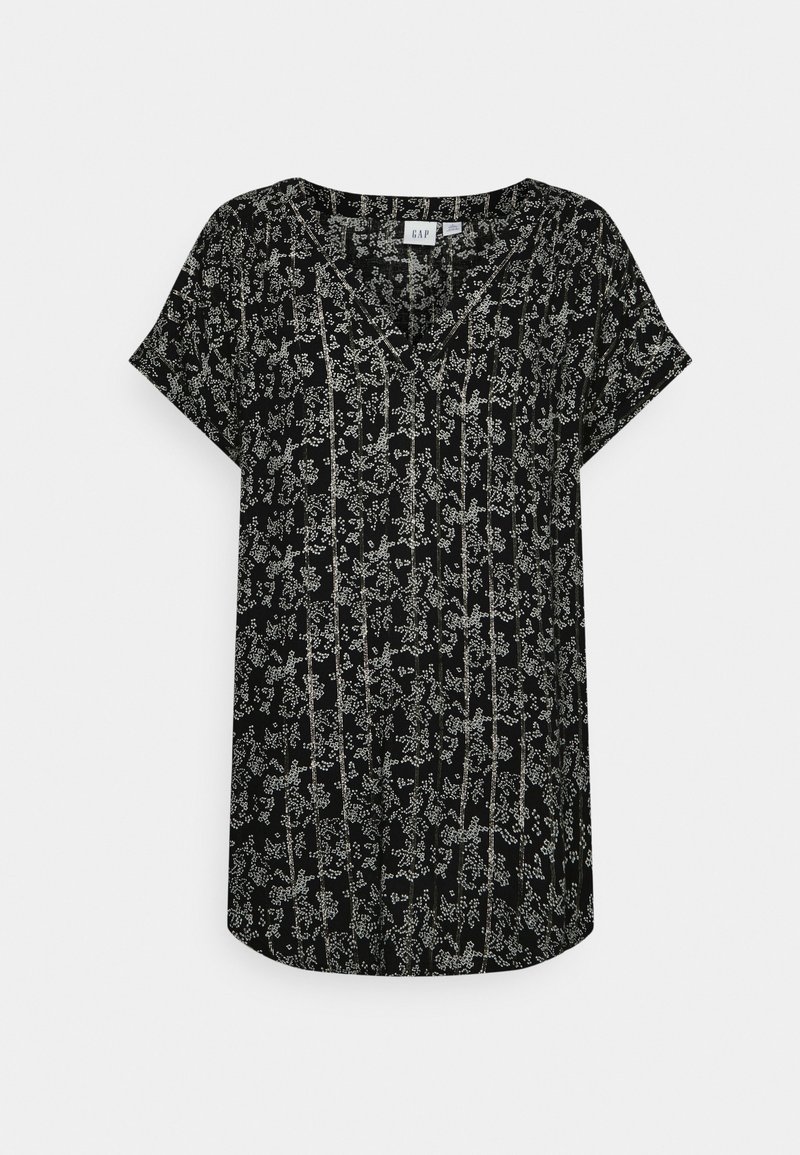 Blusa nera a maniche corte con motivo floreale bianco, scollatura rotonda e vestibilità morbida. Tessuto morbido con una sottile texture e dettagli verticali.