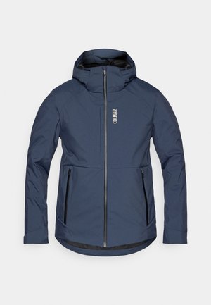 Veste bleu marine avec capuche, fermeture éclair, deux poches latérales et détail de logo, fabriquée en matériau lisse et résistant aux intempéries.