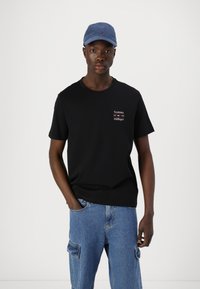 Tommy Hilfiger STACK - Print T-shirt - black