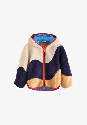 Veste polaire à capuche pour enfant avec blocs de couleurs beige, bleu marine et marron clair, fermeture éclair orange et doublure intérieure bleue.