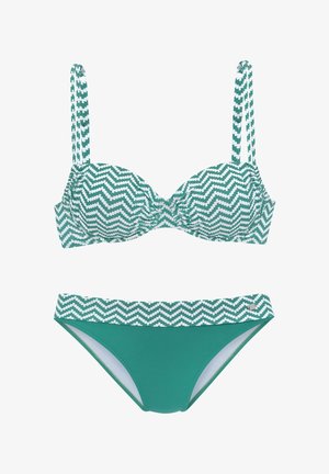 Bikini-Set mit grün-weißer Zickzackmusterung. Der BH hat vorgeformte Cups und verstellbare Träger. Der Slip besteht aus einfarbig grünem Stoff mit einem gemusterten Bund.
