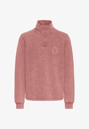 Pullover fleece in dusty rose, features a quarter zipper, ribbed cuffs, and a small circular logo on the chest. Soft texture and relaxed fit.