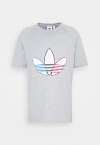 Grå bomullströja med rund halsringning. Har en flerfärgad grafisk logotyp i röd, blå och svart. Korta raglanärmar.