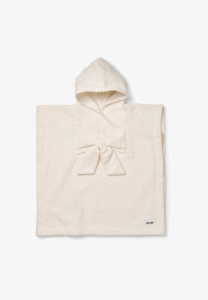 Kermansävyinen hupullinen vauvan pyyhe, jossa on kuvioitu kangas ja edessä keskellä solmittu rusetti, jossa alareunassa "Elodie"-merkki.