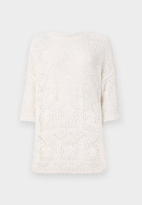Top tricoté blanc présentant un motif géométrique en point ajouré, un col rond et des manches courtes. Tissu léger et texturé.