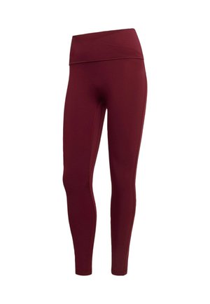 Bordeauxrote Leggings aus elastischem Stoff mit hohem, breitem Bund und nahtlosem Design, mit glatter Textur und figurbetonter Silhouette.