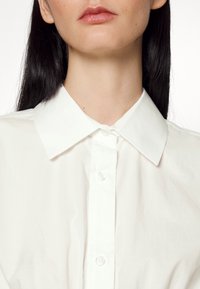 DESIGNERS REMIX Blusa - beige