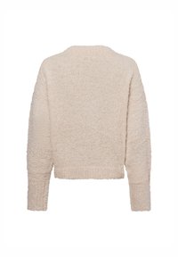 Heller beige, verkürzter Pullover mit weicher, flauschiger Textur, langen Ärmeln und rundem Ausschnitt, ausgestattet mit einem gerippten Saum.