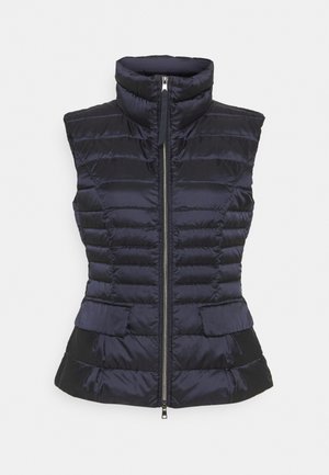 Veste matelassée sans manches noire avec col montant, fermeture éclair à l'avant, coutures horizontales et taille ajustée.