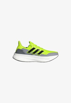 Lime green running shoe with black accents, gray midsole, and textured knit upper. Features a cushioned sole and lightweight design.