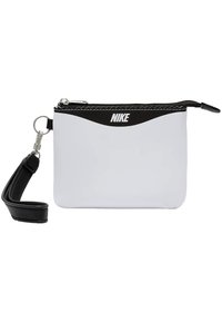 Balta Nike kišeninė rankinė su juodu užtrauktuku ir logo, su išlenktu dizainu ir nuimama juoda juosta. Lygi tekstūra, kompaktiška stačiakampio formos.