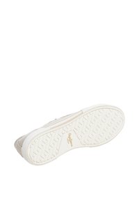 Hvit sneakersåle med teksturert, mønstret design. Materialet ser ut til å være gummi med beige tekstildetaljer og en logo preget på siden.