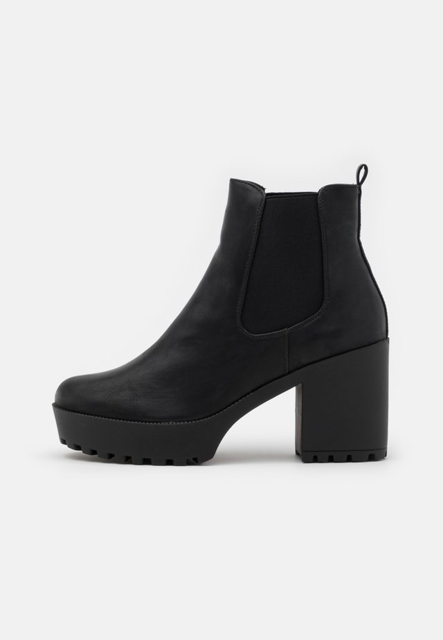 Ankelboots med høye hæler - black