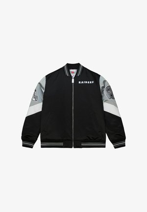 Black bomber jacket with gray sleeves and white accents. Features "RAIDERS" text, team logo on sleeve, ribbed cuffs, and waistband.