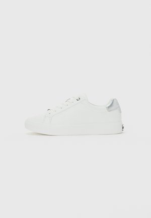 White low-top sneaker with lace-up front and silver accent on heel, displayed on plain white background.