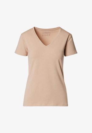 Beżowa koszulka z dekoltem w serek wykonana z miękkiej bawełny, z krótkimi rękawami i luźnym krojem. Prosty design, bez ozdób i wzorów.