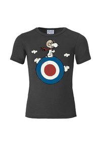 Black short-sleeve t-shirt featuring a graphic of Snoopy wearing goggles and a scarf, standing on a blue and red target design with clouds.