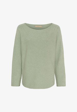 Lys grøn striktrøje med en bred, afrundet halsudskæring og lange ærmer. Har en diskret struktur og en buet kant. Brandmærket er synligt.