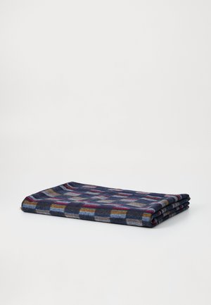 Woven blanket in dark blue with a multi-colored checkered pattern; soft texture, folded neatly with a clean finish.