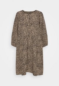 Svart och beige knälång klänning med rund halsringning, långa ärmar och ett texturerat abstrakt tryckmönster. Löst sittande design.