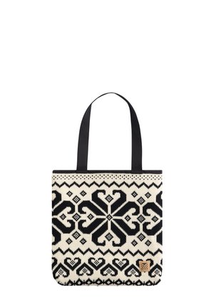 Handlenett med svart-hvitt symmetriske geometriske og hjerte mønstre, med svarte håndtak og en liten brun logo-lapp nederst til høyre.