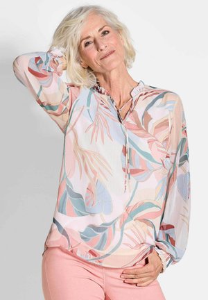 Doorzichtig bloemenblouse in zachte pastelkleuren; voorzien van een gerimpelde halslijn, lange mouwen en een ontspannen pasvorm met subtiele bladvormen.