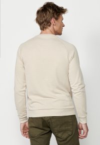Koroshi Sportska majica - off-white