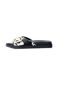 Black and white slide sandals with a textured fabric upper featuring a gold rectangular buckle and a flat black rubber sole.