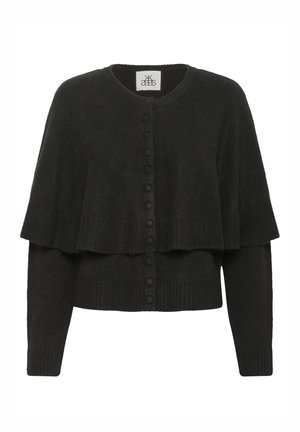 Musta kootud kardigan kihilise disainiga, ümmarguse kaelusena ja nööbilukuga. Omab pikki varrukaid ja tekstureeritud kangast.