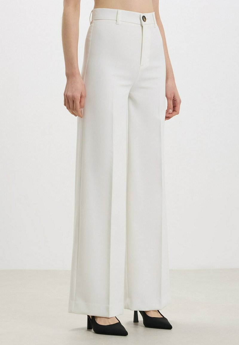 Calliope PALAZZO Pantaloni bianco Zalando.it