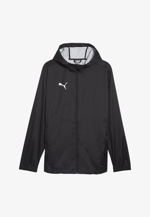 Schwarze leichte Jacke mit einem Frontreißverschluss, ausgestattet mit einer Kapuze und elastischen Bündchen. Auffälliges weißes Puma-Logo auf der linken Brust.