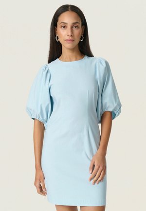 Light blue short dress with puff sleeves and a round neckline. Made from a smooth fabric with minimal details. Fitted silhouette.