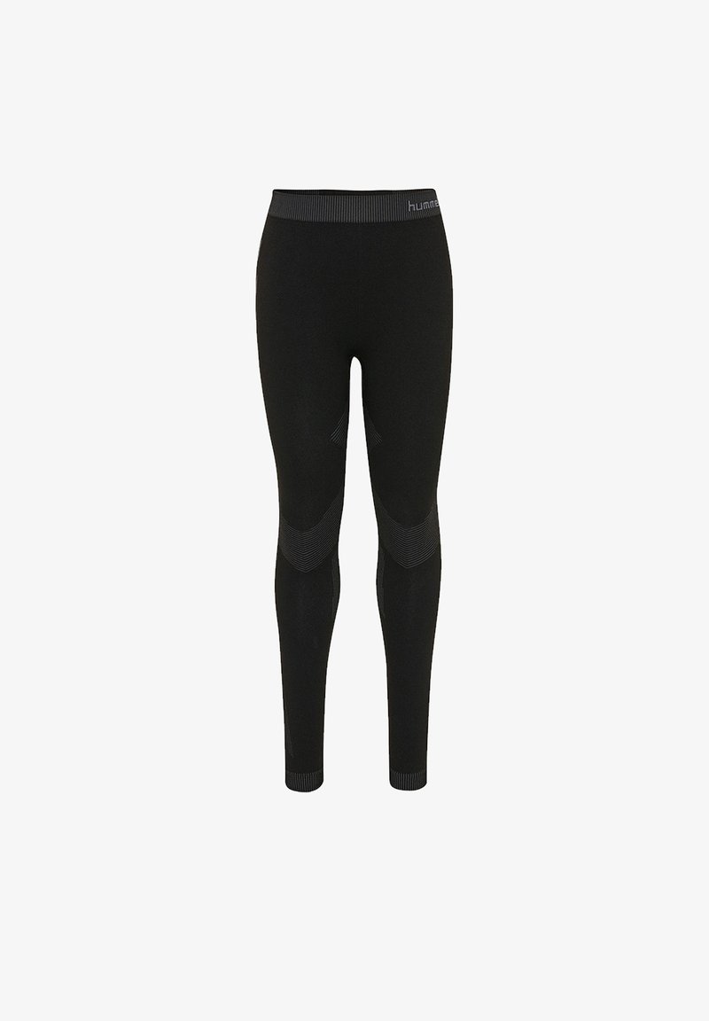 Black leggings made of stretchy fabric, featuring a wide waistband and textured design patterns along the knees for added style.