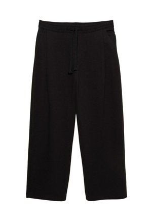 Pantaloni neri, larghi e morbidi, realizzati in tessuto soffice, con vita regolabile e tasche laterali. Lunghezza alla caviglia con una texture liscia.