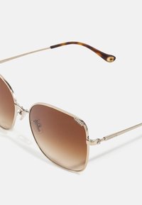 COACH Päikeseprillid - shiny light gold-coloured