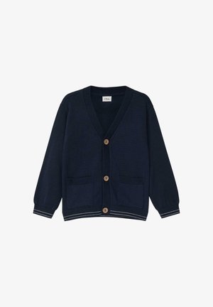 Granatowy sweter rozpinany na guziki z dekoltem w serek, długimi rękawami, czterema drewnianymi guzikami oraz prążkowanymi mankietami i dołem. Posiada dwie przednie kieszenie.