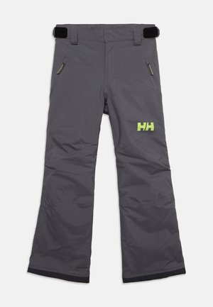 Mørkegrå udendørsbukser med justerbare taljestropper, lynlåslommer i siden og en gul "HH"-logo på højre lår.
