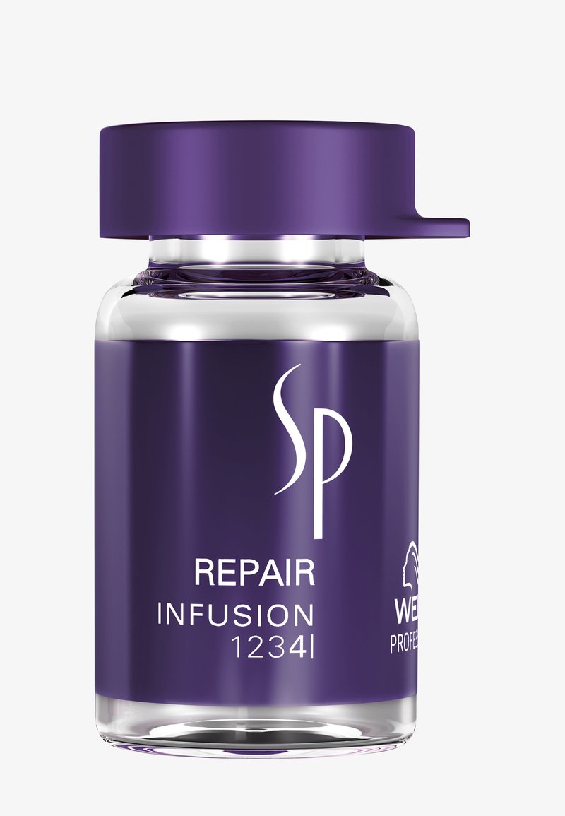 Bottiglia di vetro viola con un tappo coordinato. Presenta il testo bianco "SP REPAIR INFUSION 1234" e un logo di un leone.