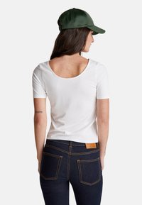 United Colors of Benetton SLIM FIT REVERSIBLE - Jednoduché tričko - white
