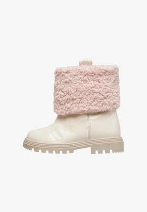 Stivale alla caviglia impermeabile color crema con un soffice risvolto in pelliccia rosa, suola spessa e finitura testurizzata. Presenta un anello per una facile calzata.
