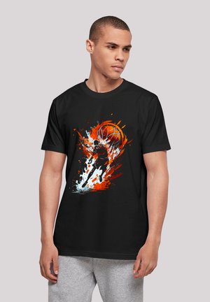 Black cotton t-shirt featuring a colored graphic of a basketball and player in action with splashes of orange and blue against a black background.