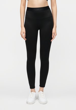 TAPE LEGGINGS - Legingi — bikses - black