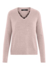 Pull à col en V rose pâle en tissu doux. Présente des manches longues et une délicate bordure en dentelle noire le long du décolleté.