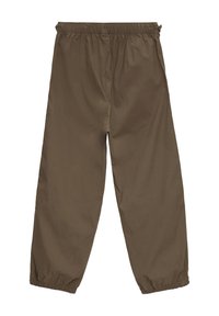 Lichte, bruine broek met een elastische tailleband, een relaxed fit en taps toelopende boorden, gemaakt van een soepele, lichte stof.