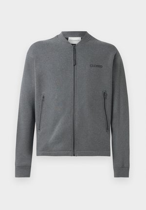 Gray zip-up sweatshirt made of soft fabric, featuring ribbed cuffs and two side zip pockets. Logo "CLOSED" on the left chest area.
