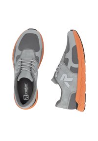 Gray athletic shoes featuring a mesh upper, suede accents, and an orange rubber sole. Notable logo on the side, with laces for secure fit.