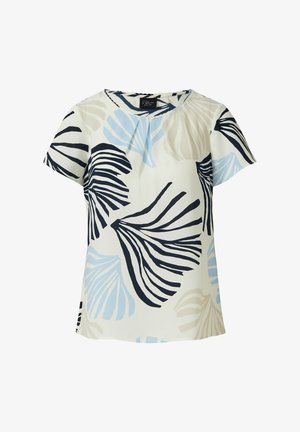 Krótka bluzka z lekkiego materiału, z białym tłem i wzorem liści w odcieniach niebieskiego i granatowego. Posiada okrągły dekolt i luźny krój.