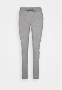 Hellgraue Slim-Fit-Sweatpants mit elastischem Bund und weißem Kordelzug, seitlichen Taschen und gerippten Knöcheln.